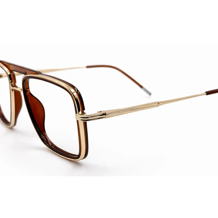 brown gold eyeglasses frame close up