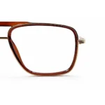 brown gold eyeglasses frame close up