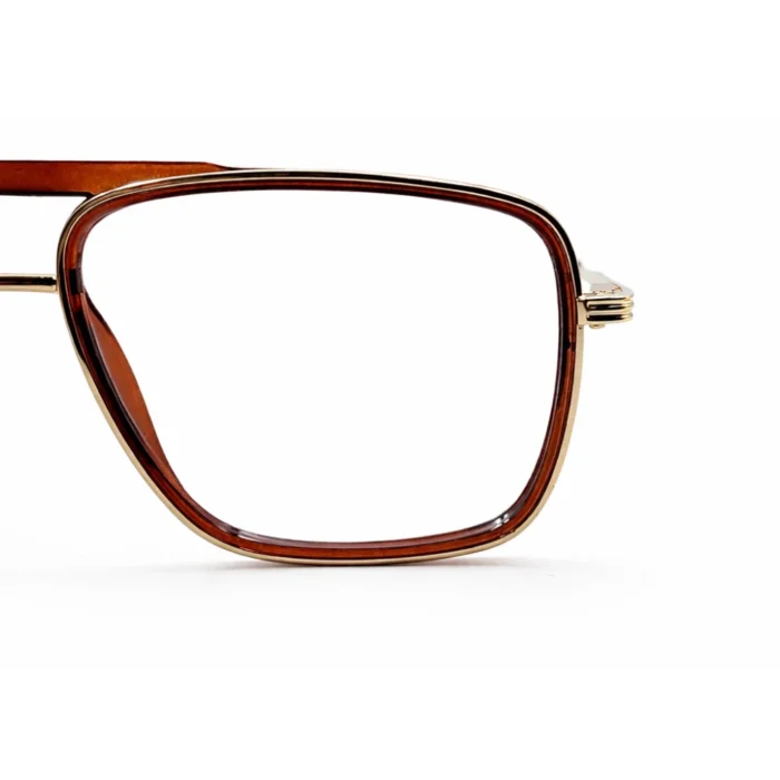 brown gold eyeglasses frame close up