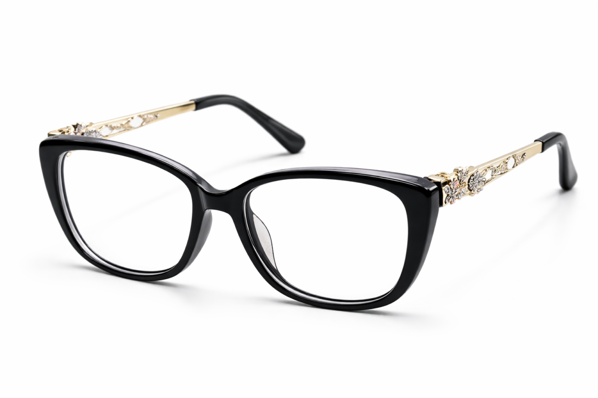"Black cat-eye eyeglasses with gold decorative temples for women"