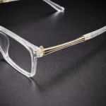 transparent specs frame gold temple detail lenstick eyewear