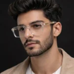 transparent specs frame worn by male model lenstick